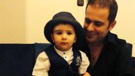 عکس/ شهید خلبان روزبه ناظریان به همراه فرزندش