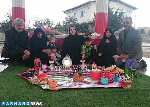 عکس/ سفره هفت سین خانواده نوروزی بر سرمزار هادی
