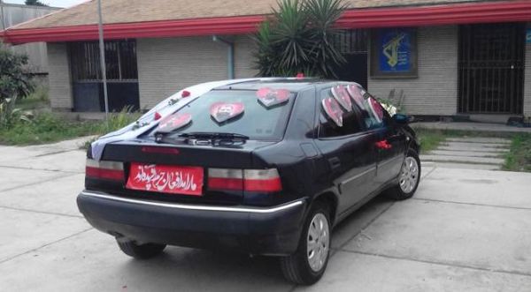 عکس/ تزیین ماشین عروس به یاد مدافعان حرم