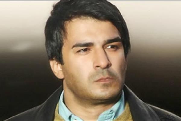 یوسف تیموری و پسر دورگه اش+ عکس